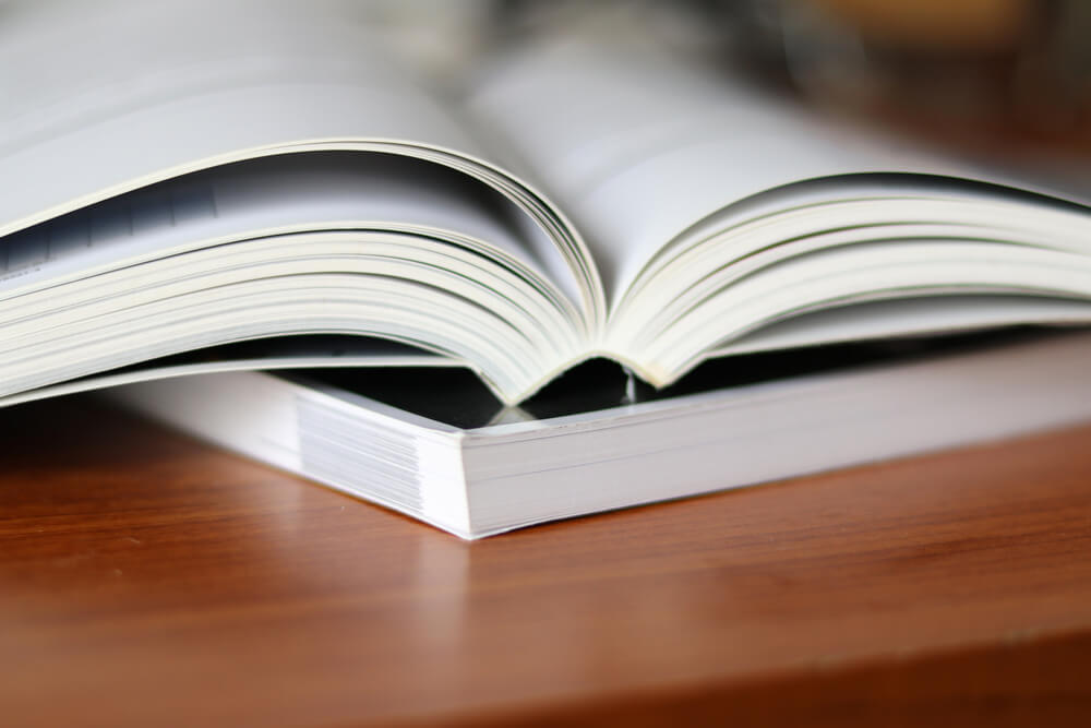 Requirements for hot melt adhesive particles in copperplate paper book binding